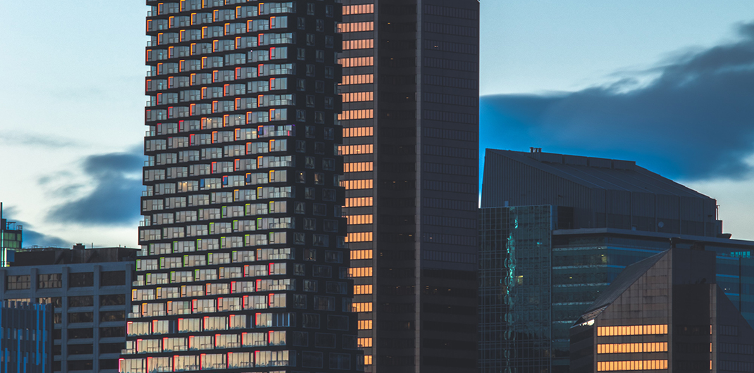 photo of a high rise against an evening sky
