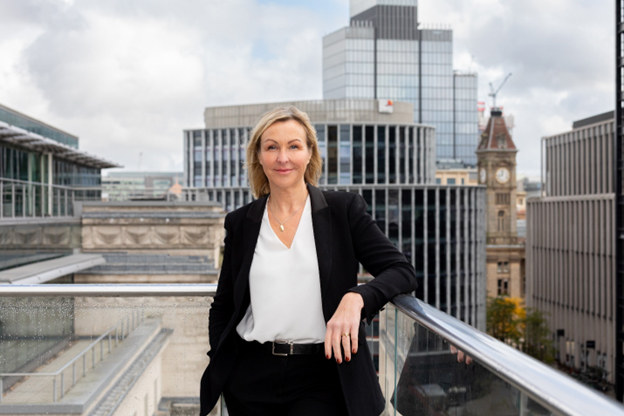 Helen Collins standing on top of a building in Central Birmingham