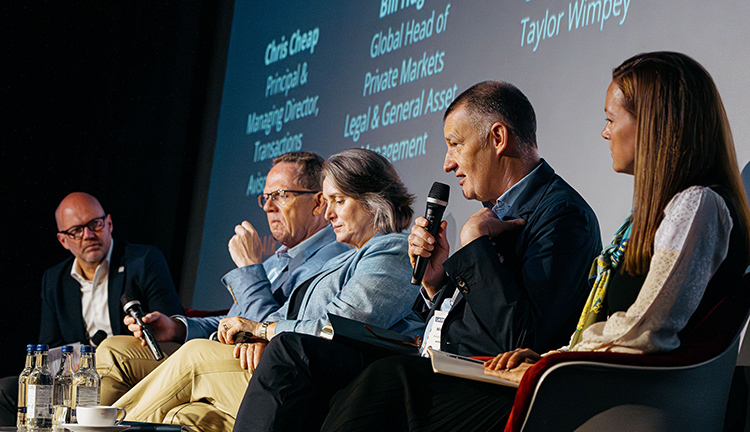 Members of the Avison Young at a panel discussion at UKREiiF